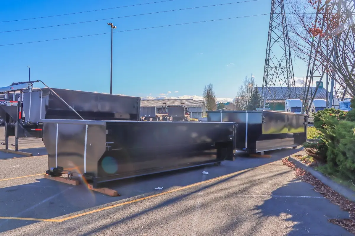 Roll-off dumpster ready for waste disposal at job site for Estate Cleanout Dumpster Rental in Wilton Manors
